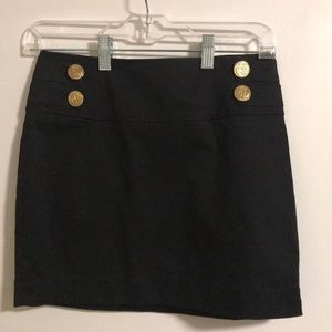 Black Express skirt with gold buttons